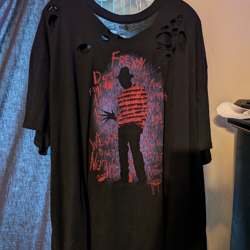 Torrid Black Tee with Red Graphic Design